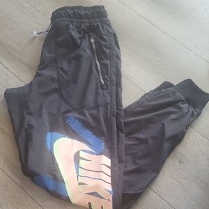 Nike Black Joggers with Blue and Orange Logo
